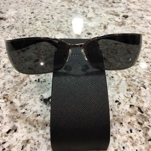 PRADA men’s sunglasses.SPR 53F Shiny Gunmetal Gray